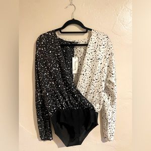 Two tone body suit from VICI. Medium. New with tags.